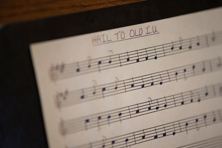 A shallow-focus image of the sheet music to the university anthem, "Hail to Old I.U."